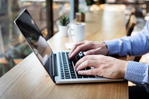 cyber-security-awareness-month-laptop-coffee-shop